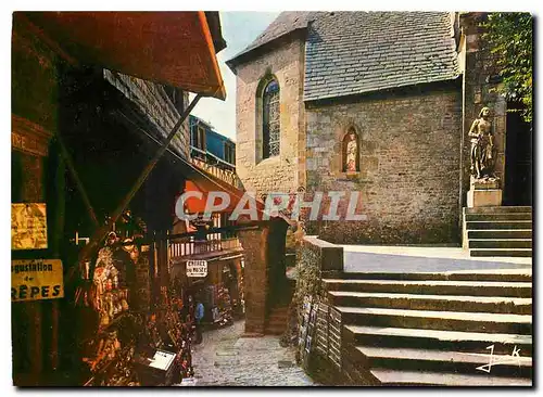 Cartes postales moderne Merveille de l'Ossident Le Mont Saint Michel La Grande rue et l'entree de l'eglise