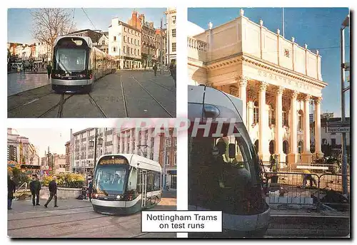 Moderne Karte Nottingham trams on test runs in Old Market Square and passing Theatre Royal in December 2003