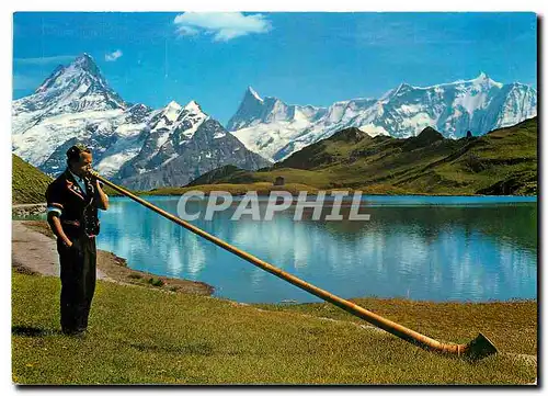 Cartes postales moderne Grindelwald Alphornblaser am Bachalpsee mot Schreckhorner