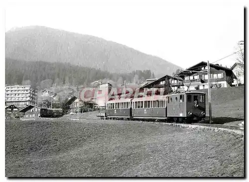 Cartes postales moderne Entre Grindelwald Station et Grindelwald Grund BOB He 2 2 15 AB 36 AB 77 2e train avec la WAB He