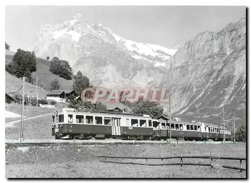 Cartes postales moderne Abeh en tete d'un train pres de Grindelwald au fond le Wetterhorn