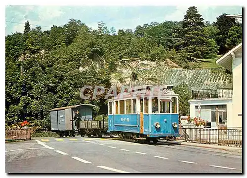 Moderne Karte Tram Be 2 2 8 en tete d'un train da marchandises a Bex