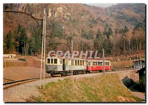 Moderne Karte Tram ABDe 4 4 3 en course d'essais avec voiture moderne AOMC B 25 entre Verchiez et Aigle