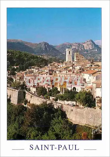 Cartes postales moderne Saint Paul de Vence Alpes Maritimes Les remparts de la ville En arriere plan les Baous