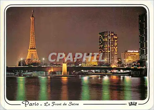 Cartes postales moderne Paris Au de la statie de la Liberte et du Front de Seine la Tour Eiffel illuminee