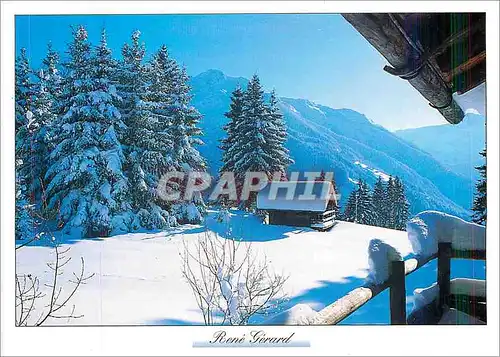 Cartes postales moderne Image de Montagne Le chalet blotti sous la neige