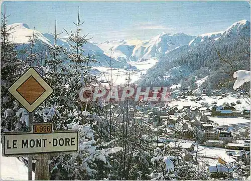 Cartes postales moderne Auvergne l'Hiver vue generale du Mont Dore au fond la chaine du Sancy