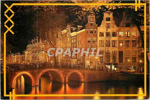 Cartes postales Amsterdam Holland Aussi le soir les canaux d'Amsterdam offrent un beau spectacle