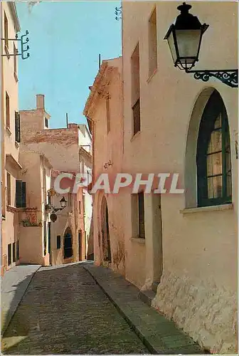 Moderne Karte Sitges (costa dorada) une paisible rue blanche