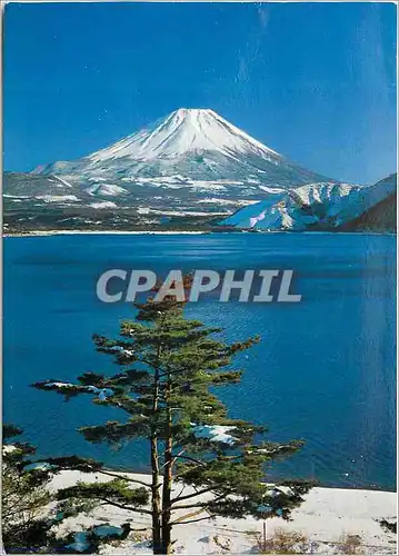 Cartes postales moderne Snow Covered Mt Fuji its Perfect Cone shape Against Blue Skies In the Foreground is Lake Motosu