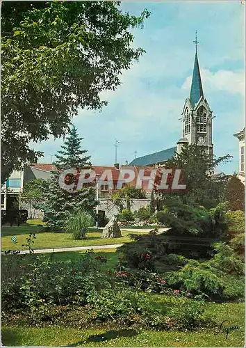 Cartes postales moderne Les Mureaux (Yvelines) Le Parc Jean Vauzelle et l'Eglise