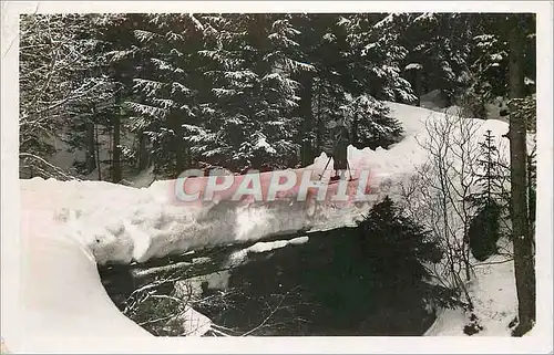 Cartes postales L hiver a pralognan la vanoise (alt 1430m) le pont de neige vous mene a l autre rive