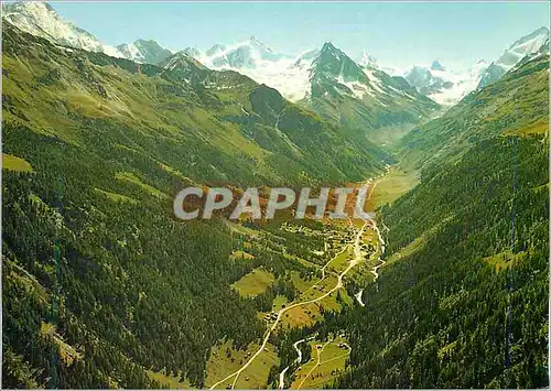 Cartes postales moderne Zinal Valais Suisse Vue aeriene Au fond les Alpes valaisannes avec le majestueux Cervin