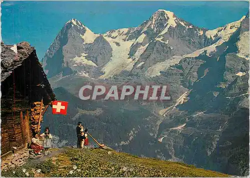 Cartes postales moderne Joueur du Cor des Alpes et sa Famille L'Eiger et Le Monch
