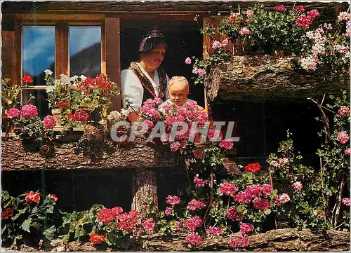 Cartes postales moderne Souvenir de Suisse A Evolene Canton du Valais Femme Enfant