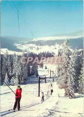 Cartes postales moderne Le haut jura en hiver l arrivee au sommet Ski
