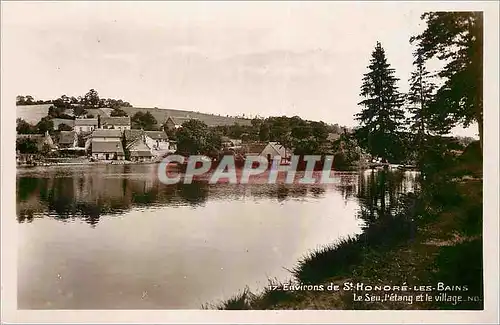 Cartes postales moderne Environs de St Honore les Bains Le Seu l'etang et le village
