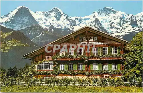 Cartes postales moderne Berner Oberlander Chalet mit Eiger Monch und Jungfrau