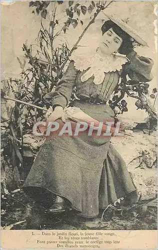 Cartes postales Dans le Jardin Fleuri la Jeune fille Songe Et les Reves troublants font passer sous ses Yeux