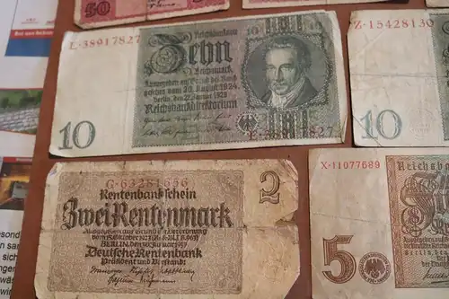 sieben alte Geldscheine Reichsmark und Notgeld von Freiburg