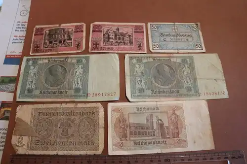 sieben alte Geldscheine Reichsmark und Notgeld von Freiburg