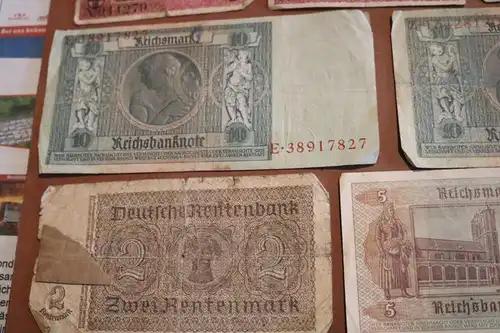 sieben alte Geldscheine Reichsmark und Notgeld von Freiburg