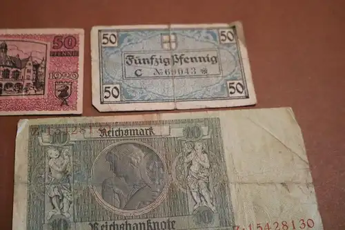 sieben alte Geldscheine Reichsmark und Notgeld von Freiburg