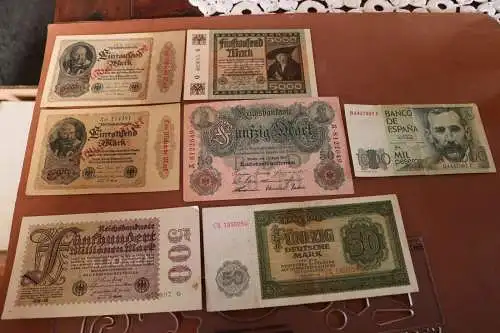 Sieben  alte Banknoten -  sechs Deutsches Reich und eine spanische