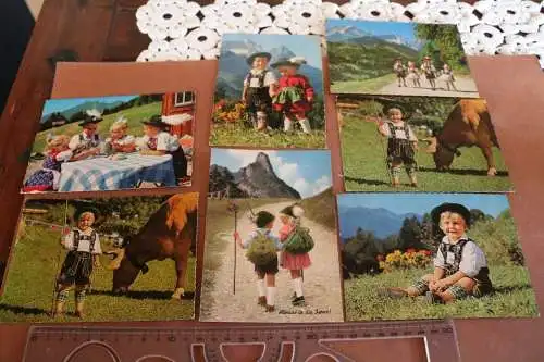 sieben alte Karten mit bayrischen Buben und Madels in Tracht - 60-70er Jahre??