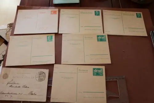 sieben alte Ganzsachen Postkarten - DDR  und eine Ungarn