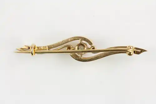 Brosche, 1. Hälfte 20. Jh., 18 Karat Gold, mit Brillanten (ca. 0,2 ct) besetzt.  L: 45 mm