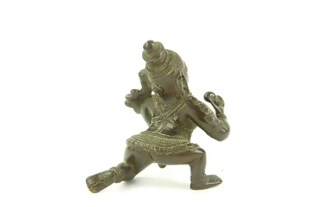Krishna - Figur, Indien, 19./20. Jh., Bronze, Krishna kniend und Hand auf Butterkugel, Gebrauchsspuren. H: 8 cm. 2