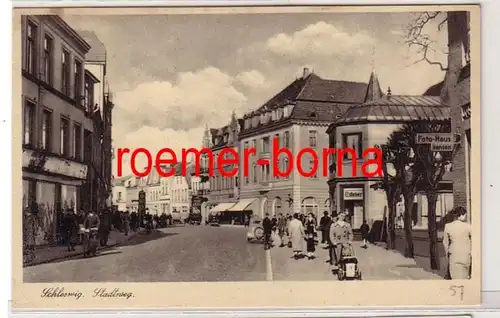 79233 Ak Schleswig-Straßeweg avec des magasins autour de 1920