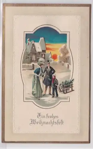98934 geprägte Ak Ein frohes Weihnachtsfest: Familie mit Schlitten um 1915
