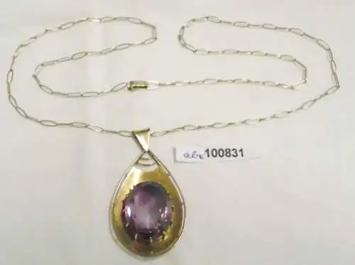 belle chaîne 333er or avec magnifique pendentif 333'or avec grande pierre pourpre