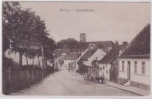 87300 Ak Belzig Bahnhofstrasse mit Fuhrwerken um 1930