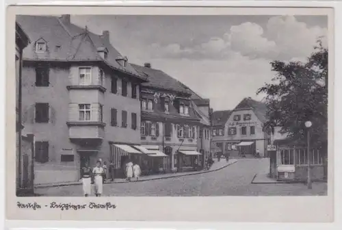 98607 Ak Taucha Leipziger Strasse mit Geschäften um 1940