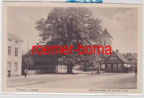86141 Ak Preetz i. Holst. Kirchenstraße mit großer Linde 1929