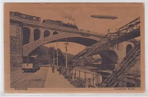 76875 Ak Elberfeld 3 Bahnen und Zeppelin an der Sonnborner Brücke 1919
