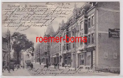83647 Ak Rumburg i.B. Bahnhofstrasse mit Geschäften 1908
