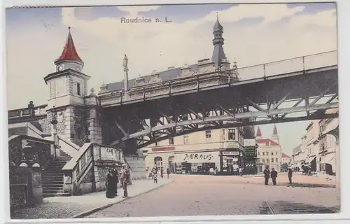 66861 Ak Roudnice nad Labem Geschäfte und Bahnbrücke 1916