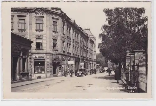 76705 Foto Ak Warnsdorf Strassenansicht mit Geschäften 1942