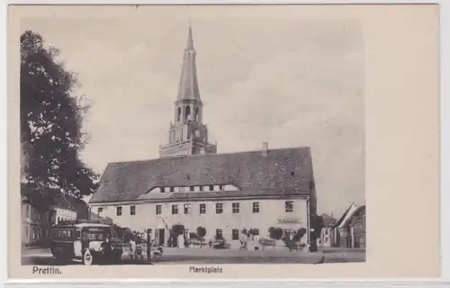 39567 Ak Prettin Partie am Marktplatz mit Rathaus, Ratskeller und Kirche um 1910