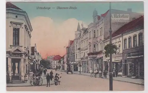 41743 Ak Wittenberge Chaussee Strasse mit Geschäften um 1920