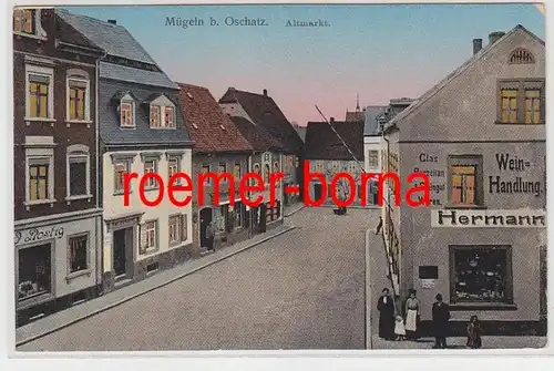 73291 Ak Mügeln bei Oschatz Altmarkt mit Weinhandlung um 1910