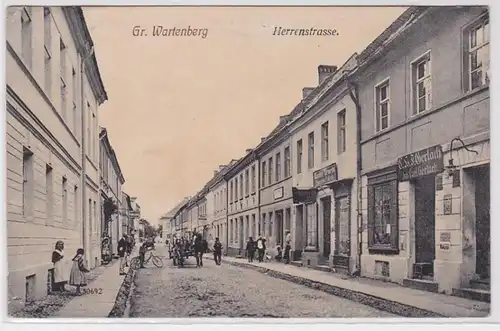 87399 Ak Groß Wartenberg Syców Herrenstrasse mit Geschäften 1911