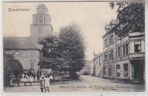 66448 Ak Neumünster derrière l'église avec l 'Église évangélique 1907