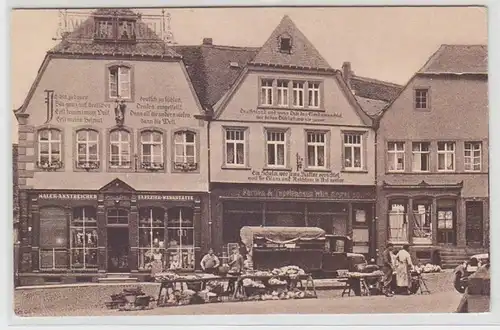 64078 Ak Häuser mit Bekenntnissprüchen am Domplatz von St. Wendel um 1930