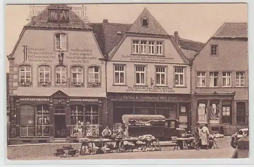 64078 Ak maisons avec des confessions sur la place du Dôme de St. Wendel vers 1930