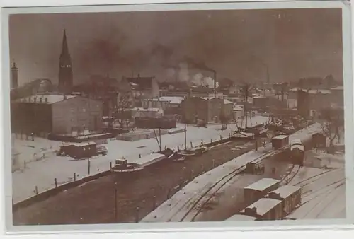 61768 Ak Elmshorn Teilansicht mit Bahnanlagen im Winter um 1920